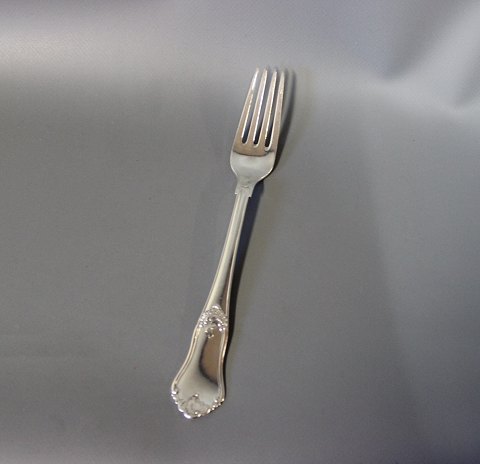 Dinner fork in Rosenholm, hallmarked silver.
5000m2 showroom.
