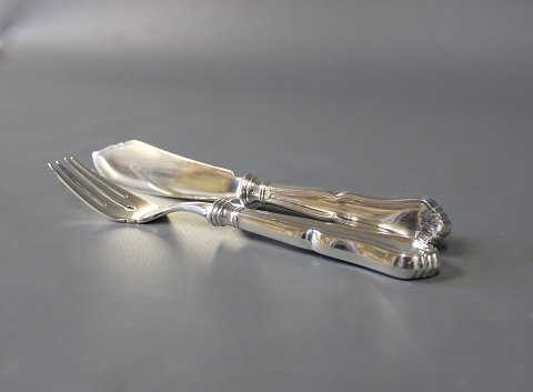 Fiskebestik bestående af kniv og gaffel i Rita, tretårnet sølv.
5000m2 udstilling.
