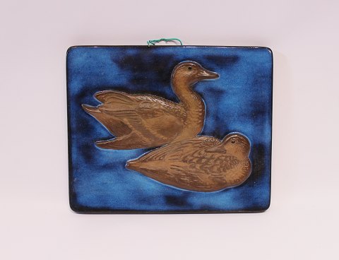 Ceramic relief with two ducks on a blue glazed background by Leif Rydeng for 
Aluminia, no.: 560/2903.
5000m2 showroom.
