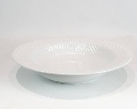 Royal Copenhagen 
white deep plate, no.: 530.
5000m2 showroom.
