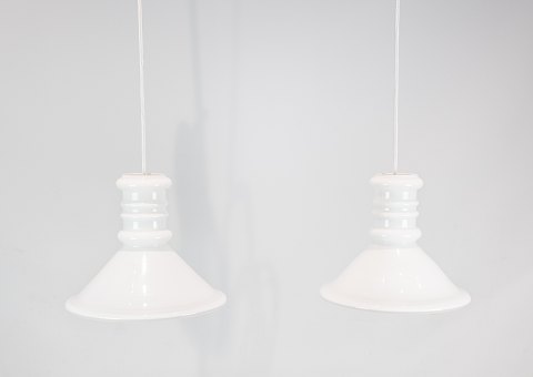 A pair of pendants of white opaline glass by Holmegaard.
5000m2 showroom.
