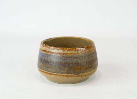 Ceramic bowl in blue and brown colours of danish design.
5000m2 showroom.