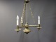 Ceiling lamp in brass from the year 1930. The lamp holds three lights.
5000m2 showroom.
