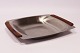 Serving dish in stainless steel with teak handles of danish design from the 
1960s.
5000m2 showroom.
