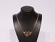 Necklace of 925 sterling silver with large pendant of amber.
5000m2 showroom.
