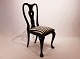 Black painted dining chair in the style of Rococo from the 1860s.
5000m2 showroom.