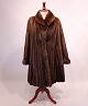 Dark brown mink fur coat by CC Fur Design Denmark and Saga Fur.
5000m2 showroom.