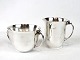 Set of sugar bowl and cream jug, no.: 456 B, in 925 sterling silver by Georg 
Jensen.
5000m2 showroom.