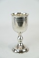 Drinking cup with decorations of hallmarked silver from the 1930s.
5000m2 showroom.