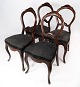 Set of four rococo dining room chairs of mahogany and upholstered with black 
fabric, in great antique condition from around 1880. 
5000m2 showroom.