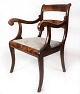 Empire antique armchair of mahogany and upholstered with light fabric from the 
1840s.
5000m2 showroom.