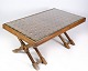 Dark wood coffee table with glass top from around the 1960s.
Great condition
